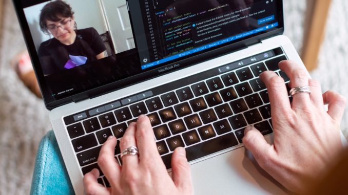 person-using-macbook-pro-3861964